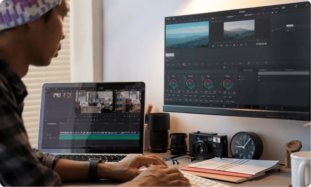 A 26Made video editor working on a multi-agency video project across two screens