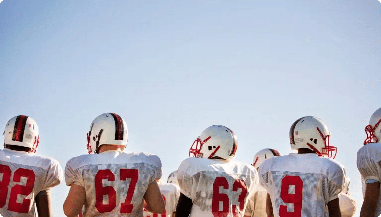 American football players standing together on the field