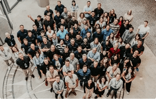 Ziflow team group photo in Warszawianka hotel hall from above shot-1